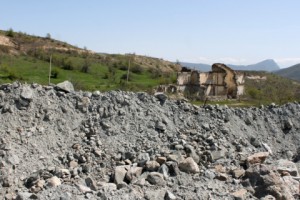 Mining’s Ghostly Spector: People Have Left a Kapan Neighborhood, to be Replaced with Trash and Tailings